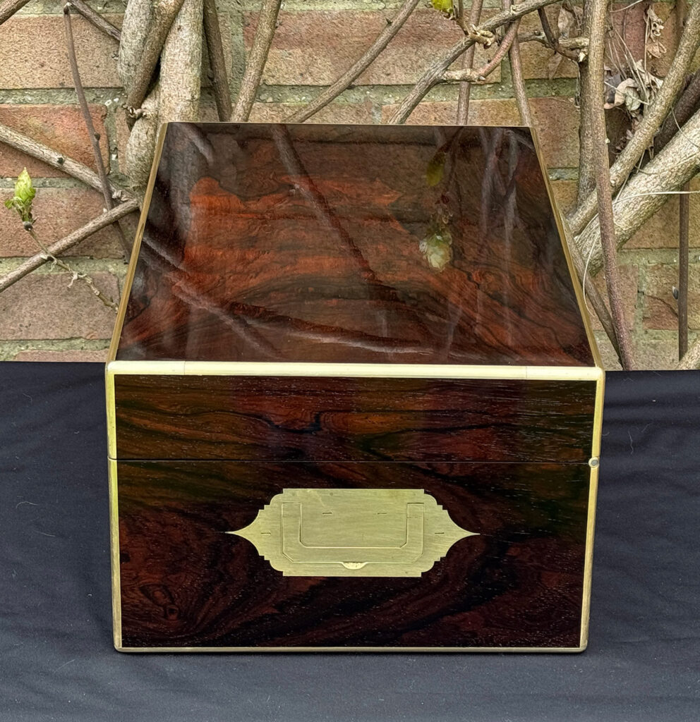 Right side view of a large antique document & jewellery box in rosewood by Edwards.