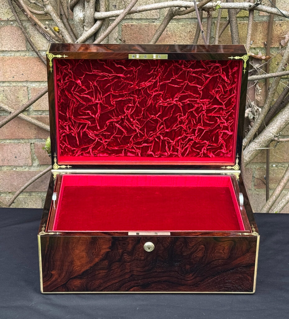 Front interior view of a large antique document & jewellery box in rosewood by Edwards.