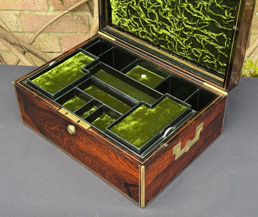 Closer interior view of an antique jewellery box in rosewood, by Edwards.