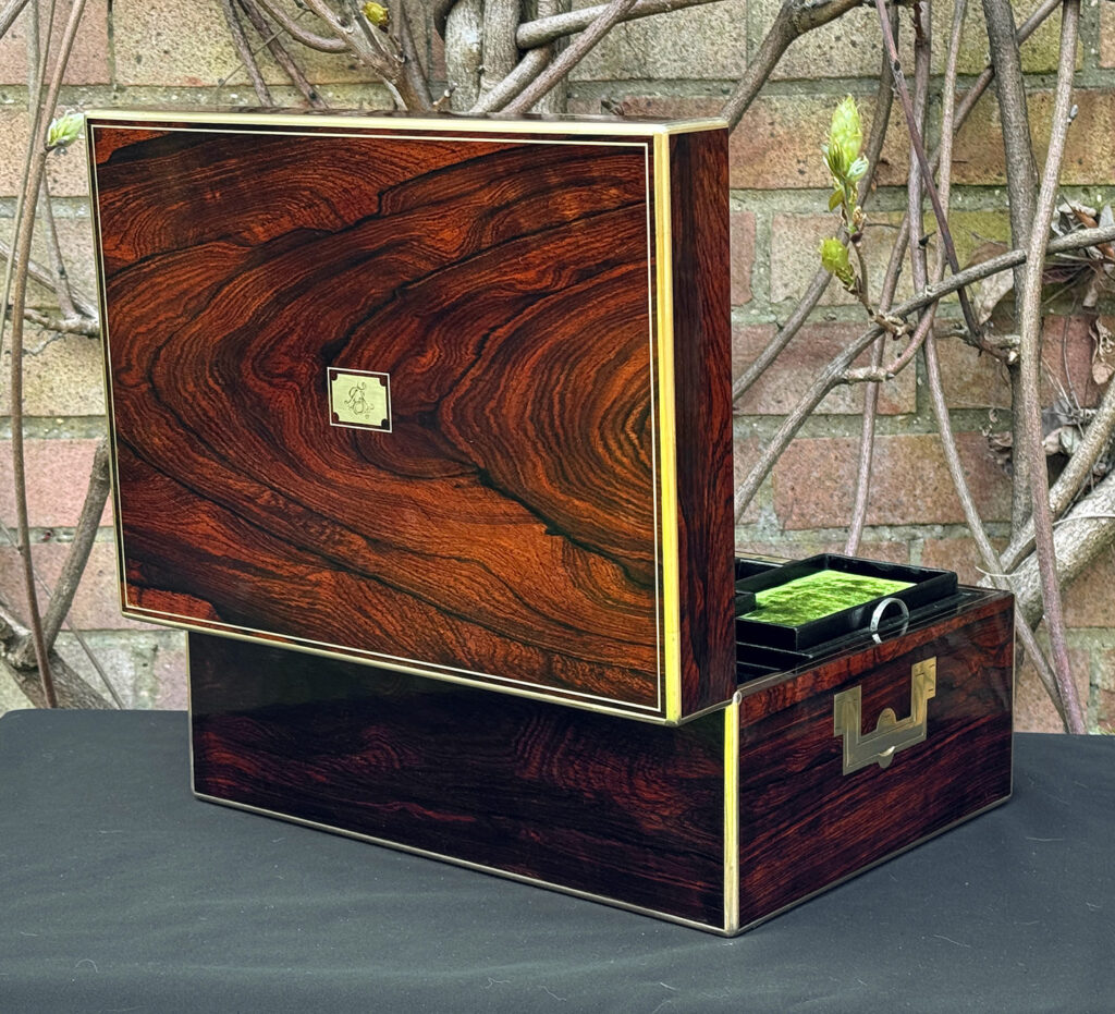 Rear opened view of an antique jewellery box in rosewood, by Edwards.