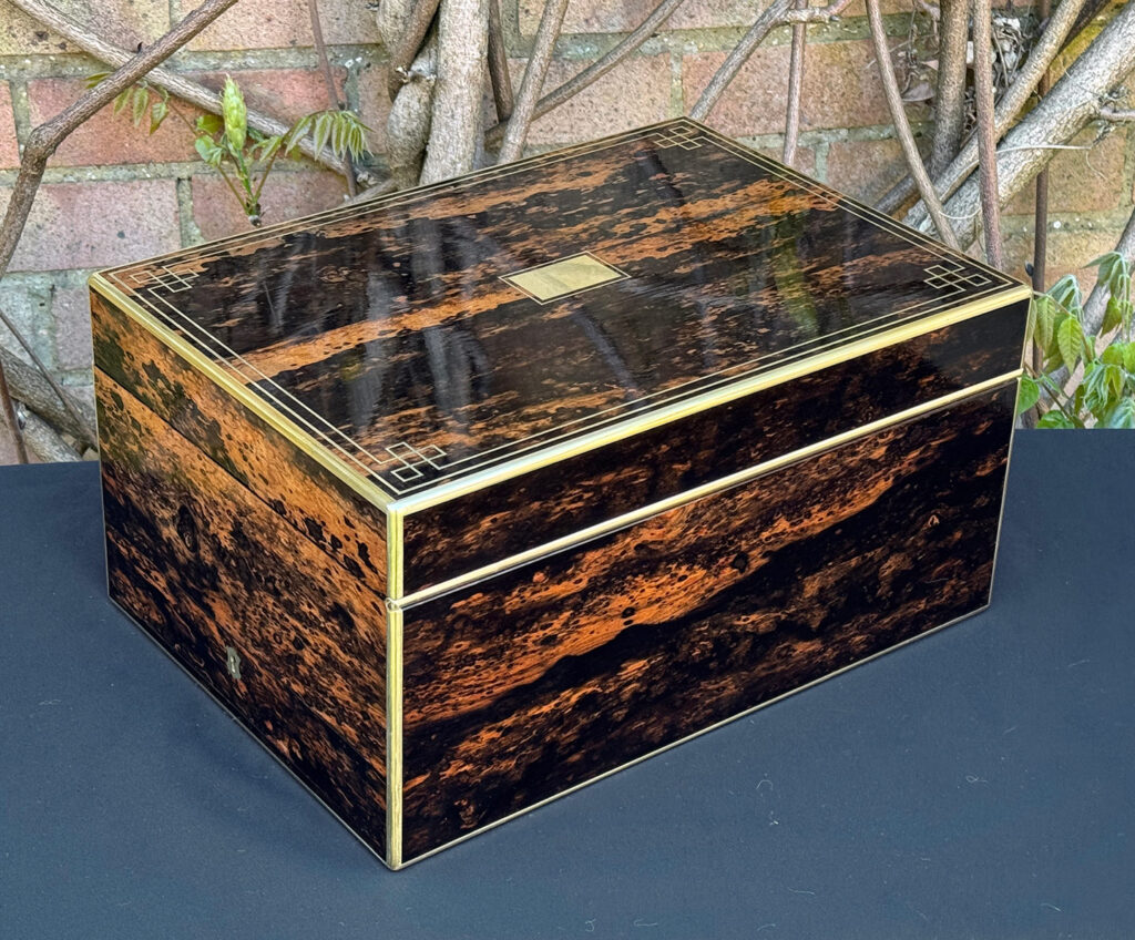 Rear right view of an antique jewellery box in coromandel, by William Lund.
