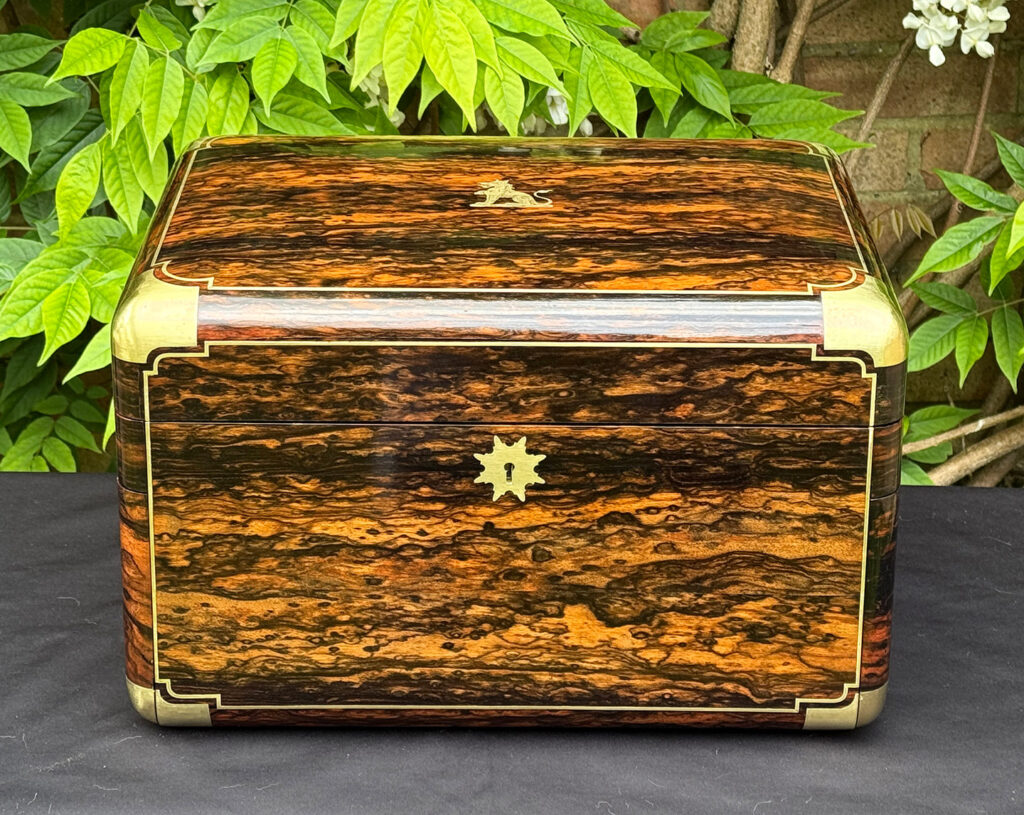 Front overhead view of an extra large antique jewellery box in coromandel with Betjemann Patent 'automatic' mechanism, by Leuchars.