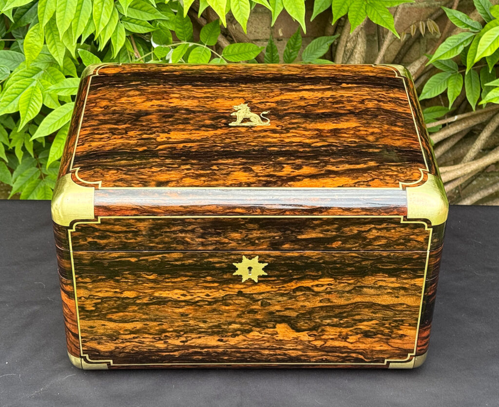 Overhead view of an extra large antique jewellery box in coromandel with Betjemann Patent 'automatic' mechanism, by Leuchars.
