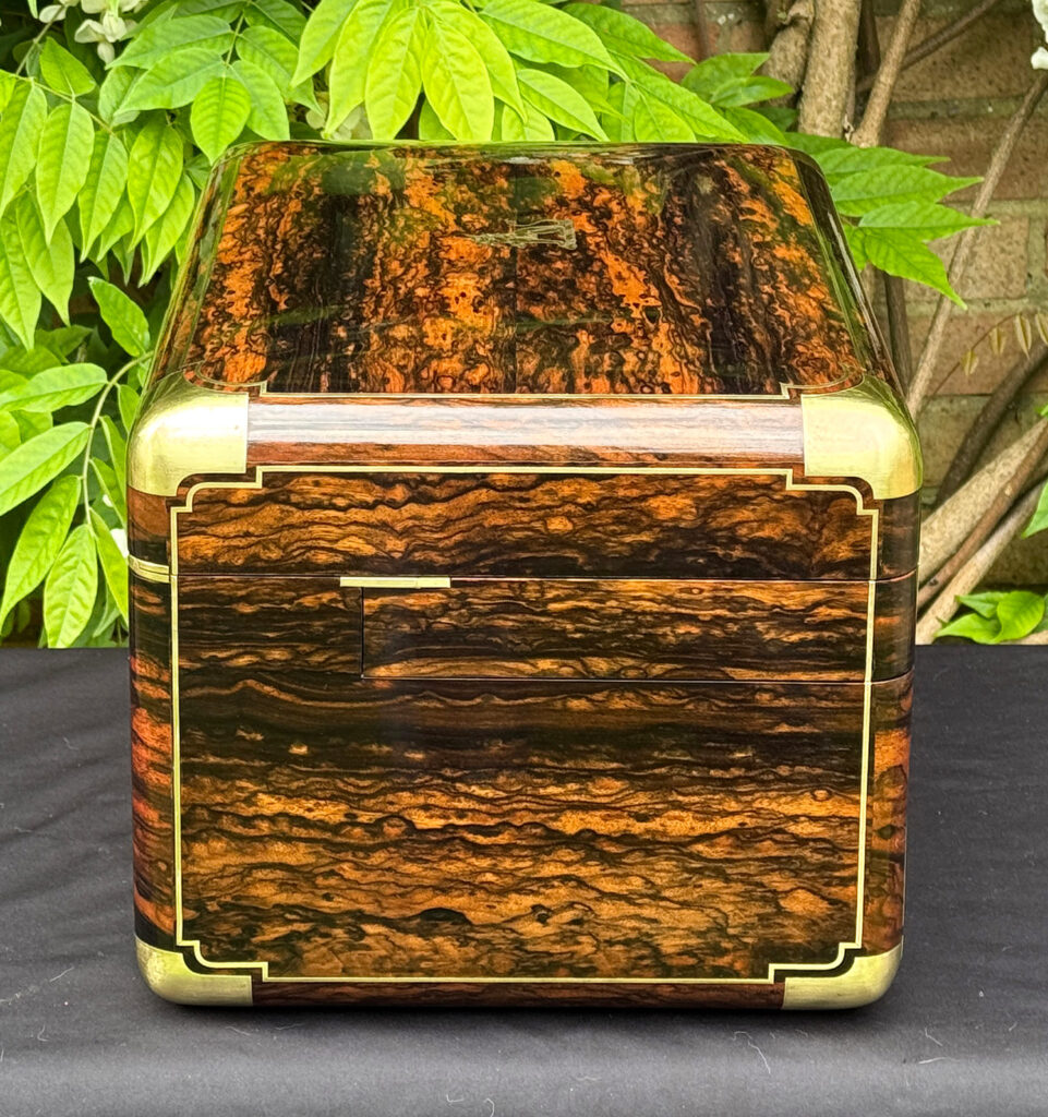 Left side view of an extra large antique jewellery box in coromandel with Betjemann Patent 'automatic' mechanism, by Leuchars.