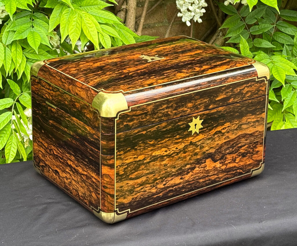 Front left view of an extra large antique jewellery box in coromandel with Betjemann Patent 'automatic' mechanism, by Leuchars.