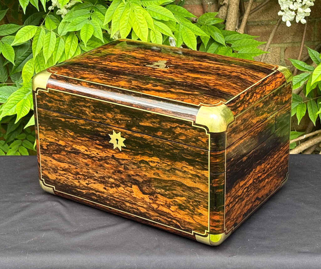 Front right view of an extra large antique jewellery box in coromandel with Betjemann Patent 'automatic' mechanism, by Leuchars.
