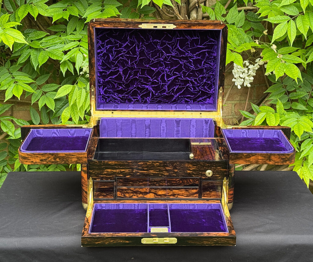 Front interior view of an extra large antique jewellery box in coromandel with Betjemann Patent 'automatic' mechanism, by Leuchars.
