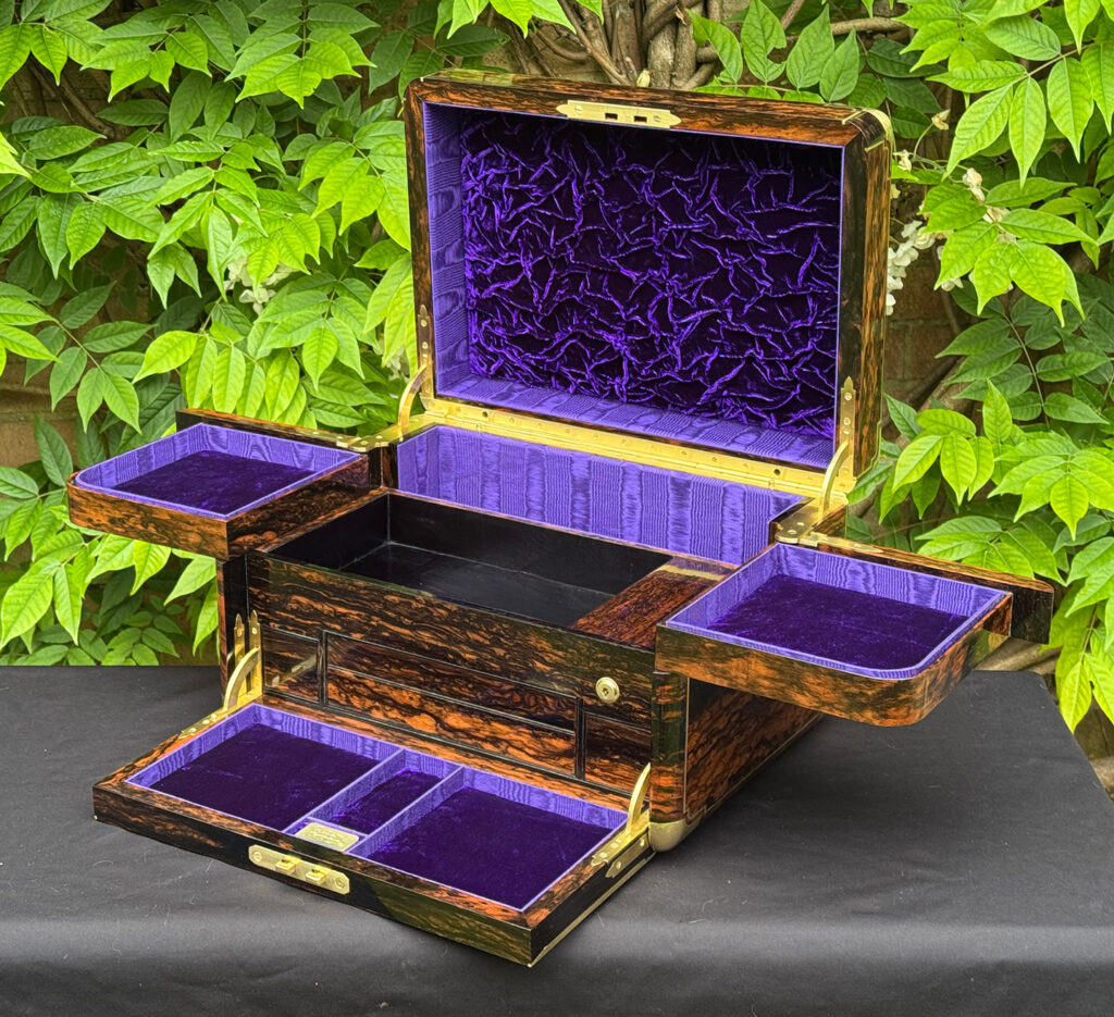 Front right interior view of an extra large antique jewellery box in coromandel with Betjemann Patent 'automatic' mechanism, by Leuchars.
