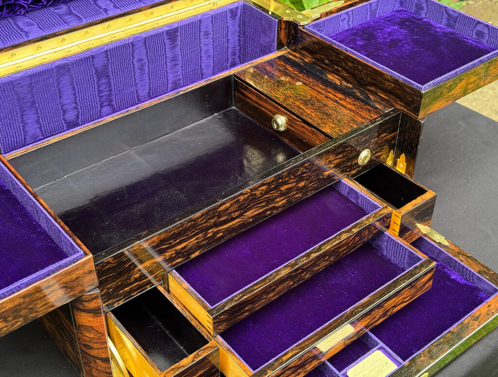 Closer view of the closed strong box drawer from an extra large antique jewellery box in coromandel with Betjemann Patent 'automatic' mechanism, by Leuchars.