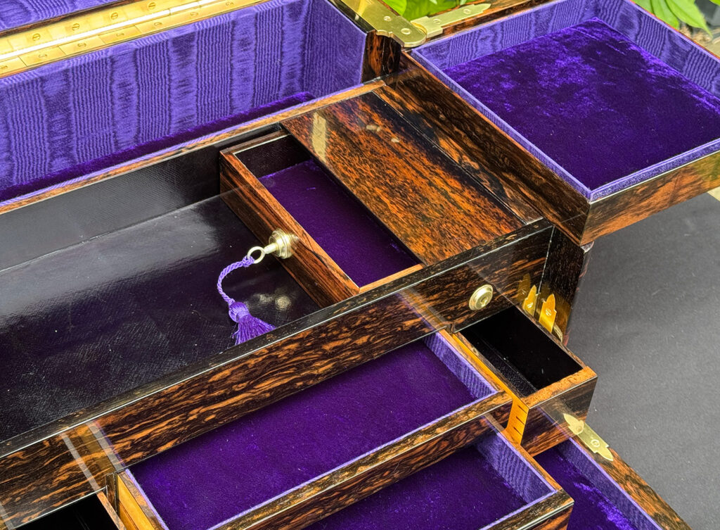 Closer view of the opened strong box drawer from an extra large antique jewellery box in coromandel with Betjemann Patent 'automatic' mechanism, by Leuchars.