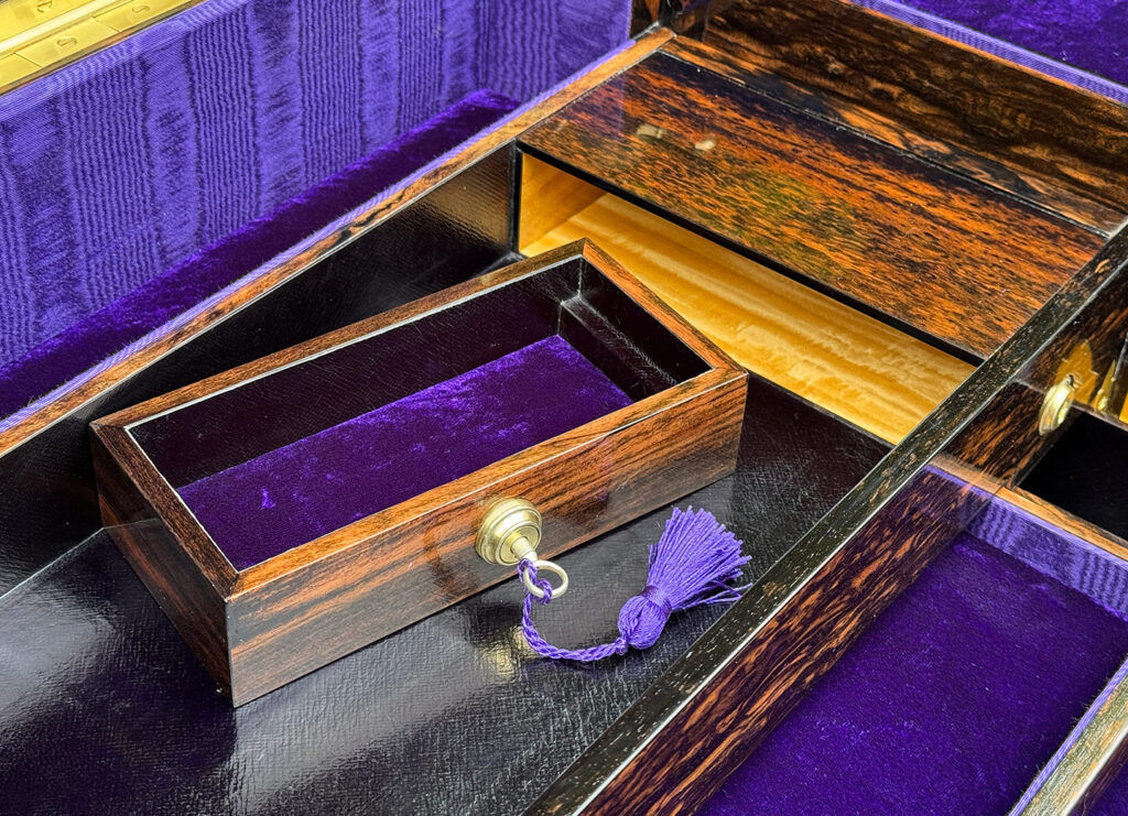 Closer view of the removed strong box drawer from an extra large antique jewellery box in coromandel with Betjemann Patent 'automatic' mechanism, by Leuchars.