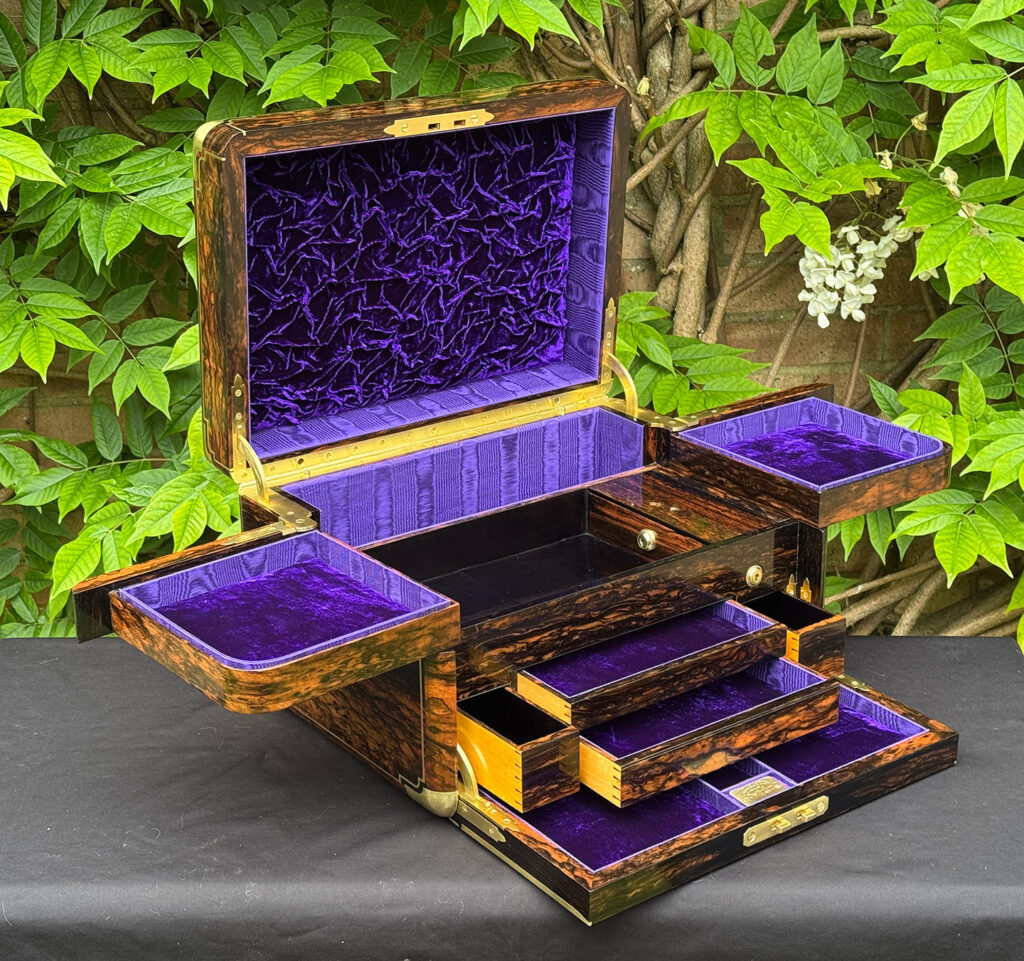 Front left interior view of an extra large antique jewellery box in coromandel with Betjemann Patent 'automatic' mechanism, by Leuchars.