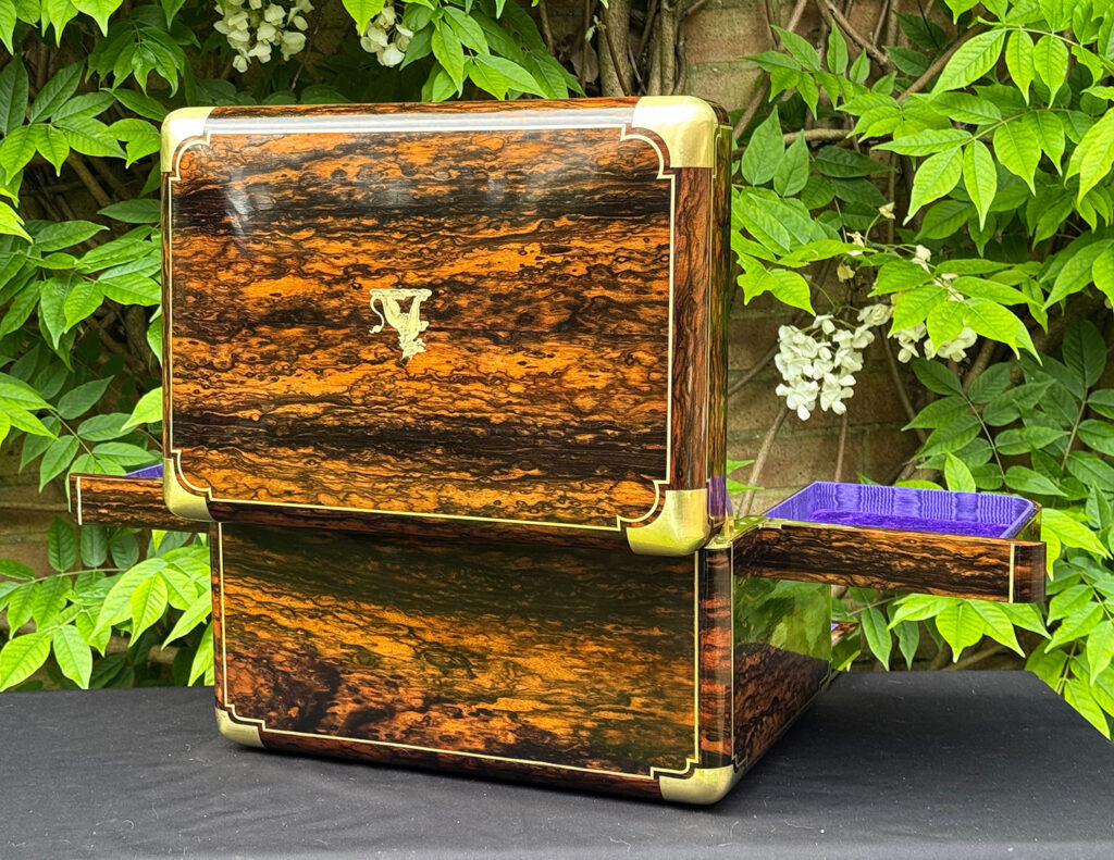 Rear left opened view of an extra large antique jewellery box in coromandel with Betjemann Patent 'automatic' mechanism, by Leuchars.