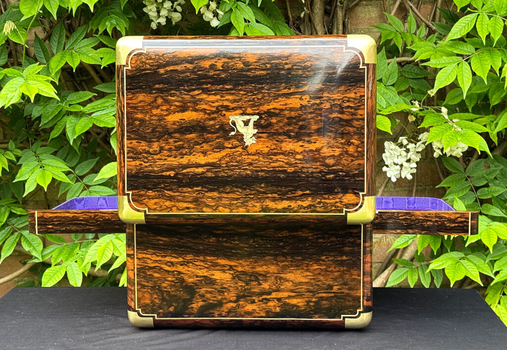 Rear opened view of an extra large antique jewellery box in coromandel with Betjemann Patent 'automatic' mechanism, by Leuchars.