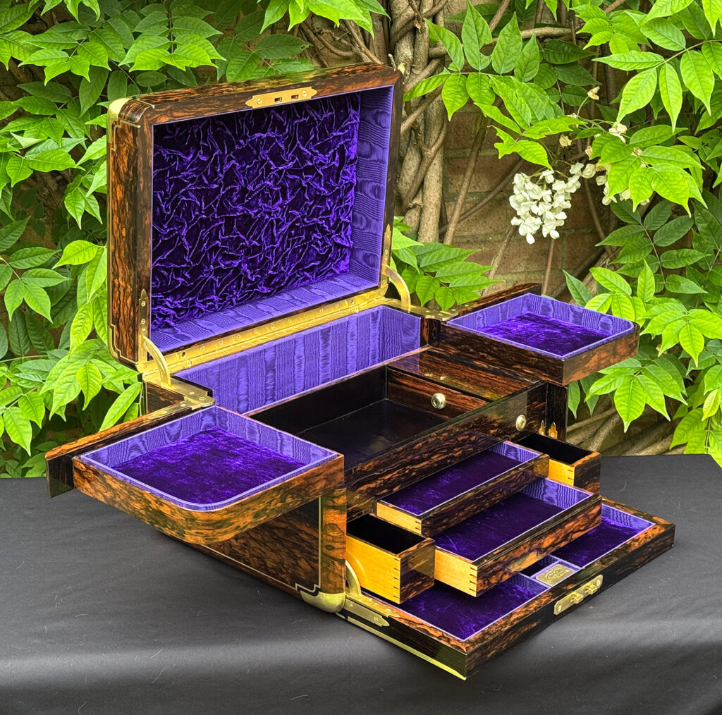 Right side interior view of an extra large antique jewellery box in coromandel with Betjemann Patent 'automatic' mechanism, by Leuchars.