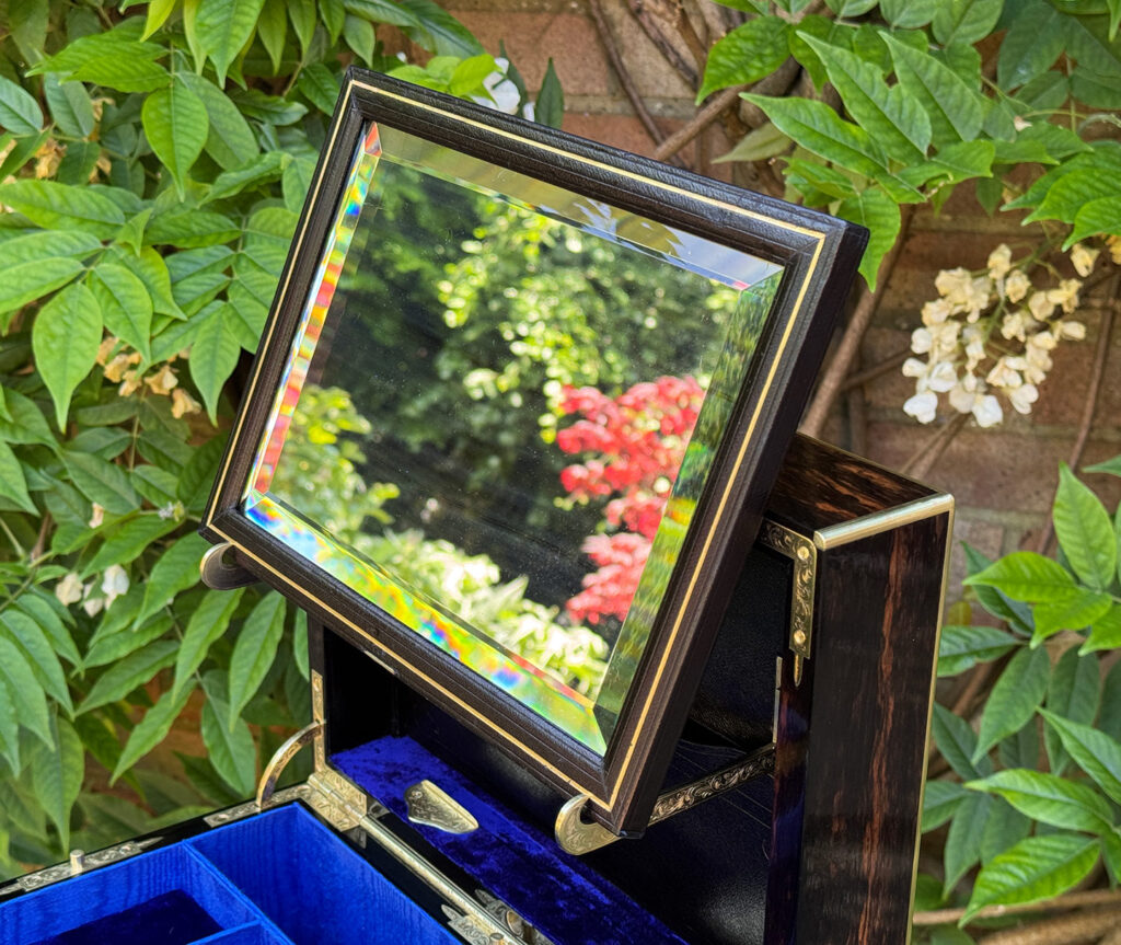 Closer view of the mirror panel on its brackets.