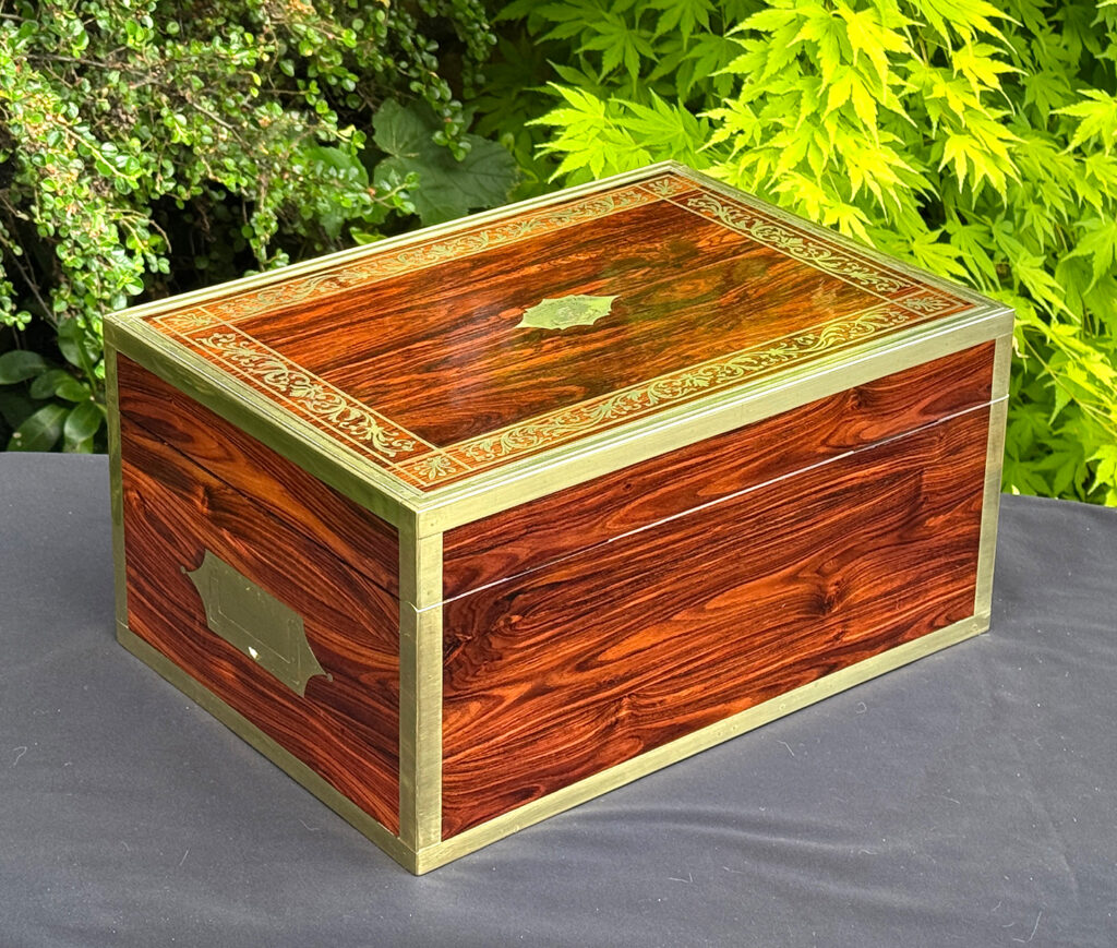 Rear right view of an antique jewellery box in kingwood, by Wells & Lambe.