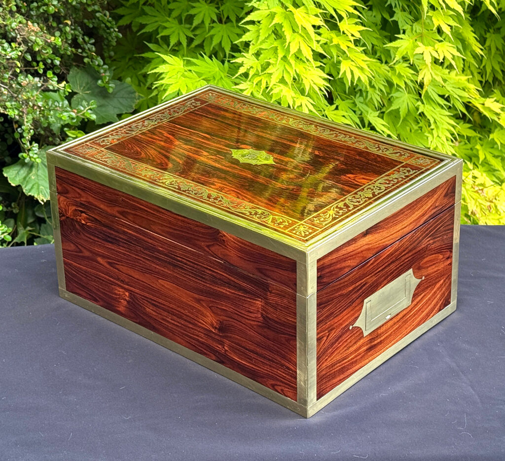 Rear left view of an antique jewellery box in kingwood, by Wells & Lambe.