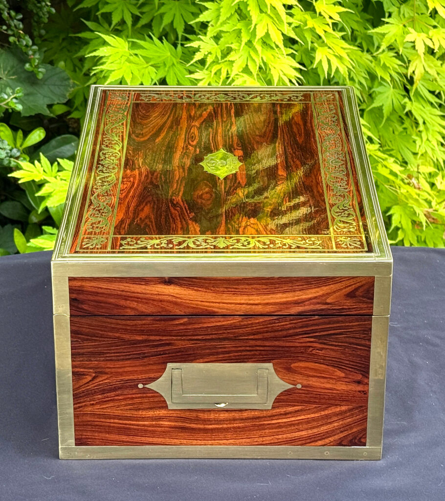 Left side view of an antique jewellery box in kingwood, by Wells & Lambe.