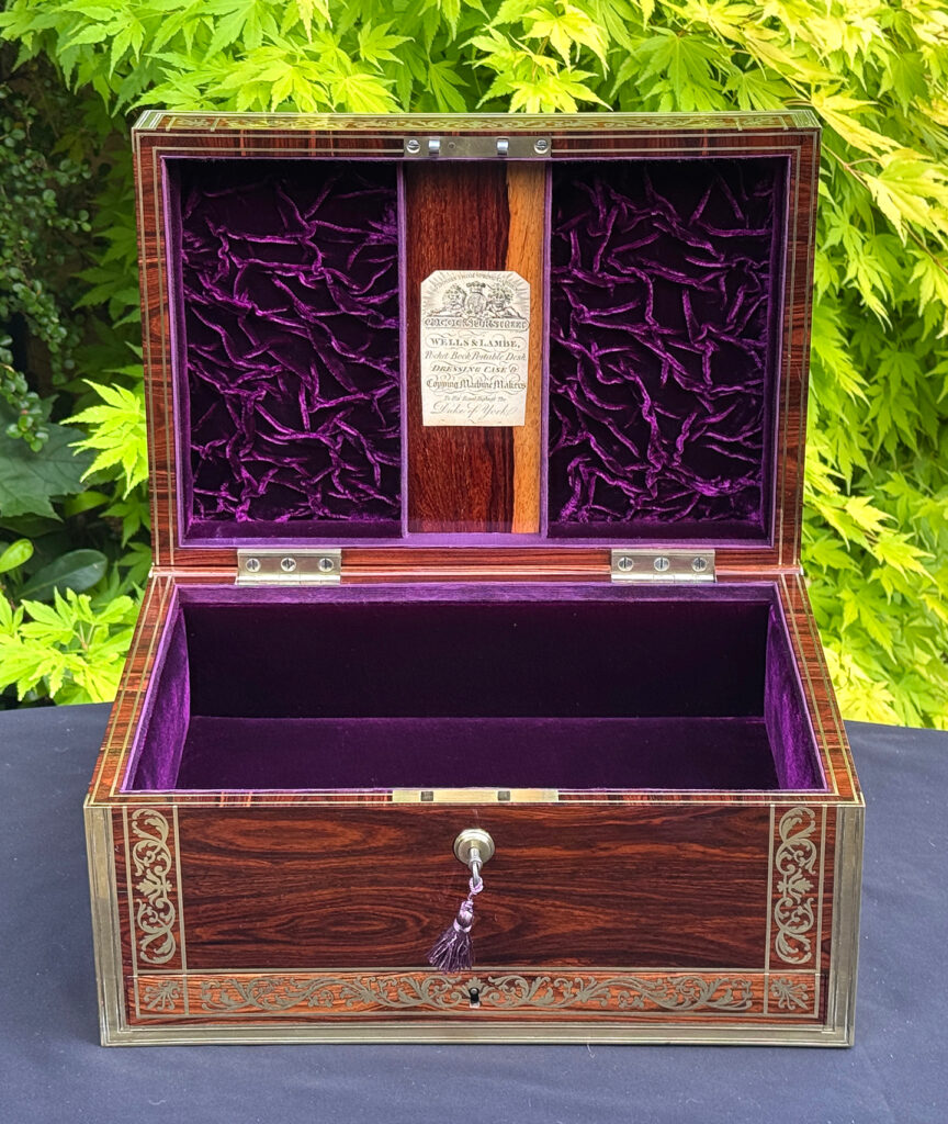 Front interior view of an antique jewellery box in kingwood, by Wells & Lambe.