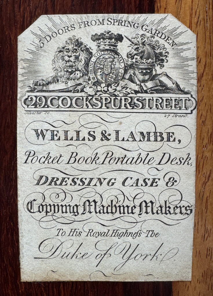 Closer view of a Wells & Lambe paper manufacturer's label.