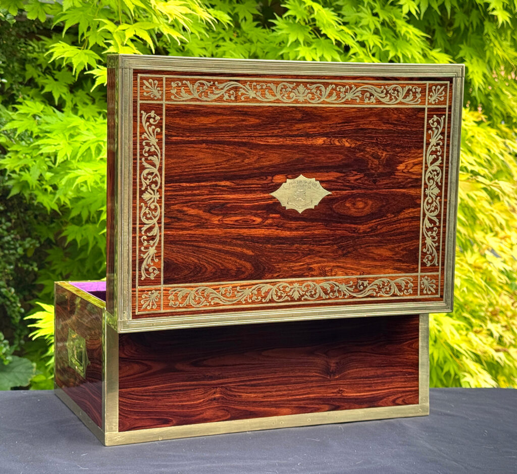 Rear opened view of an antique jewellery box in kingwood, by Wells & Lambe.