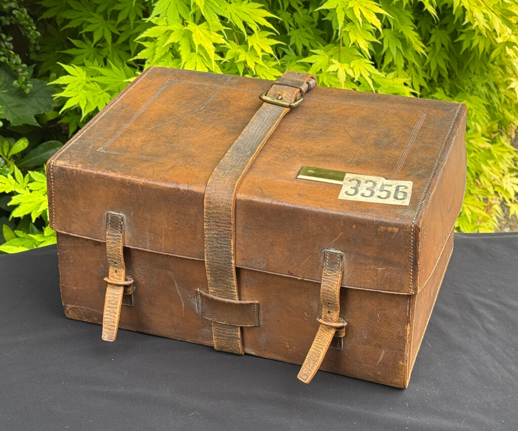 Outer leather case from an antique jewellery box in kingwood, by Wells & Lambe.