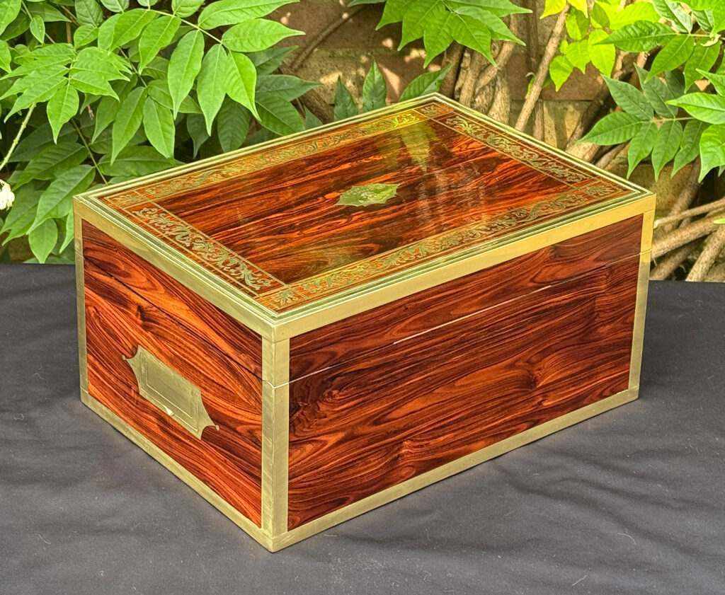 Rear right view of an antique jewellery box in kingwood, by Wells & Lambe.