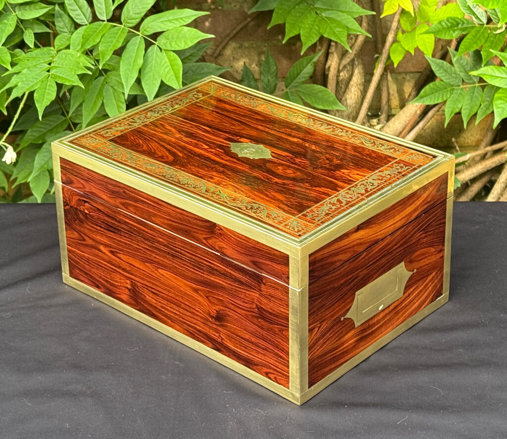 Rear left view of an antique jewellery box in kingwood, by Wells & Lambe.
