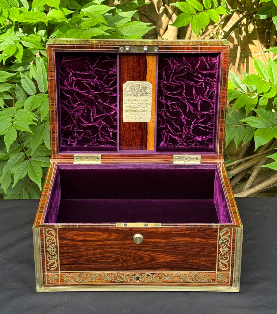 Front interior view of an antique jewellery box in kingwood, by Wells & Lambe.