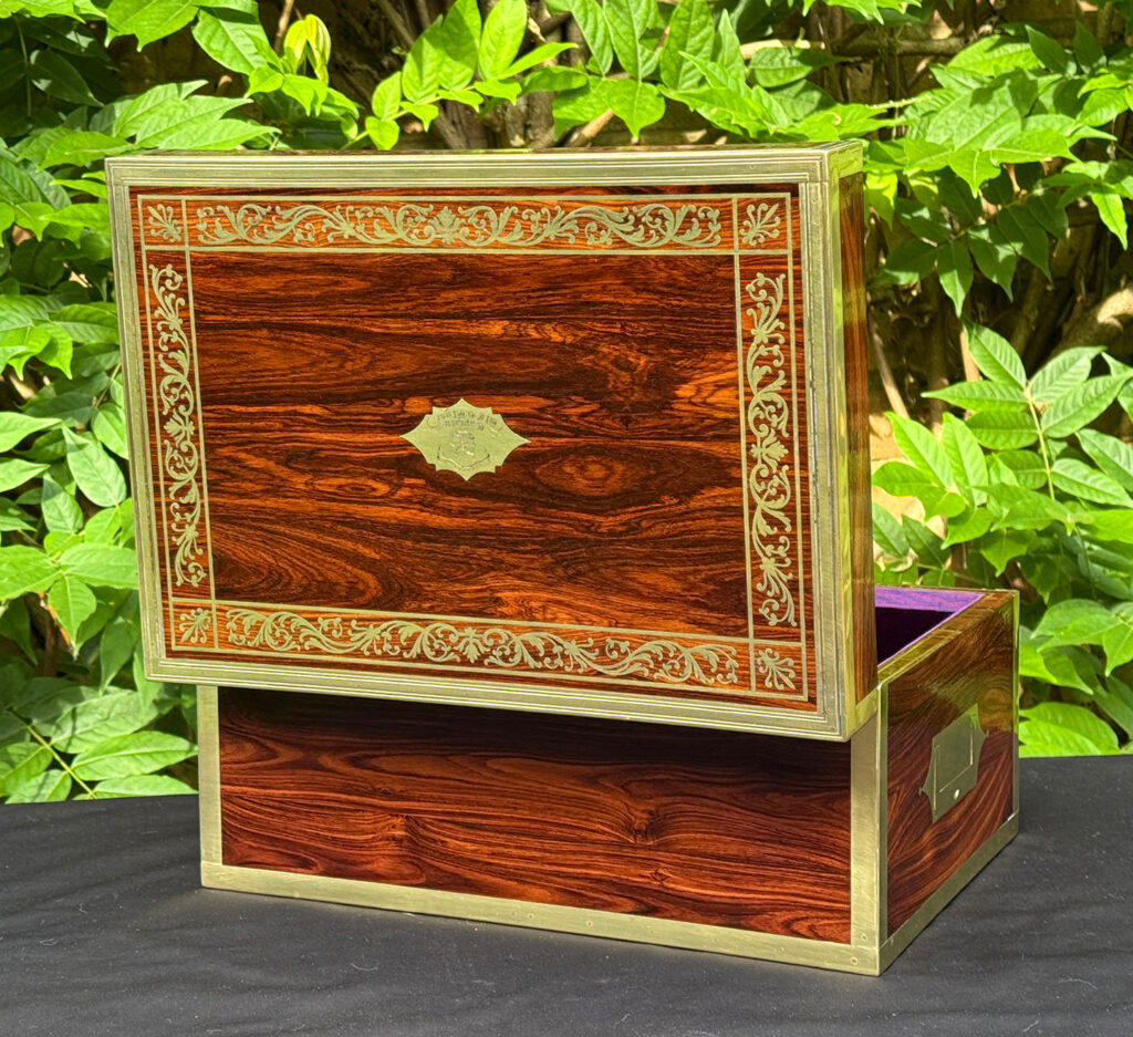 Rear opened view of an antique jewellery box in kingwood, by Wells & Lambe.