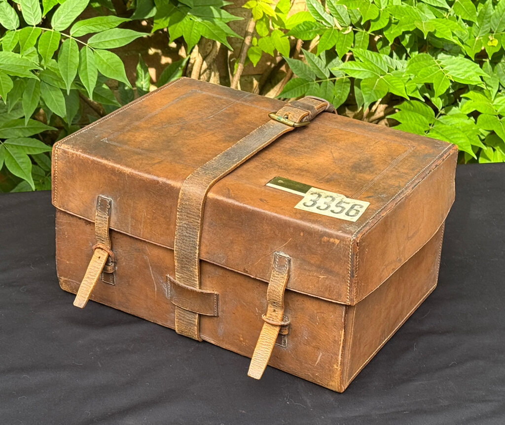 Front right view of the outer leather case from an antique jewellery box in kingwood, by Wells & Lambe.