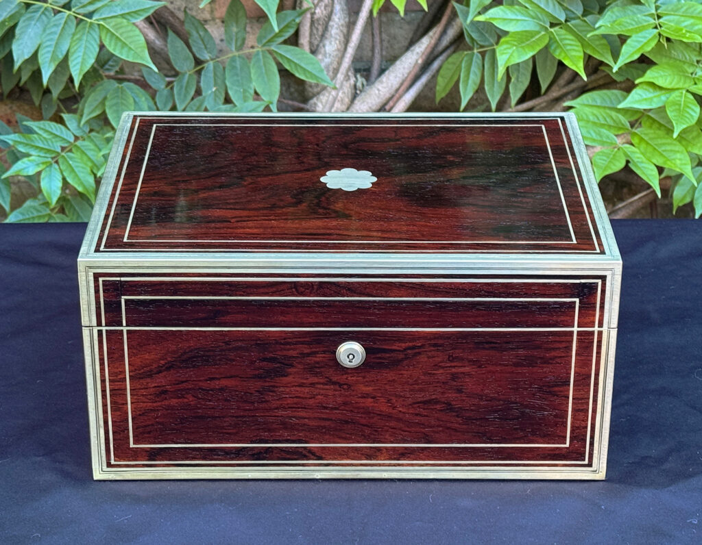 Front view of a magnificent antique 1814 dressing case in rosewood by David Edwards.