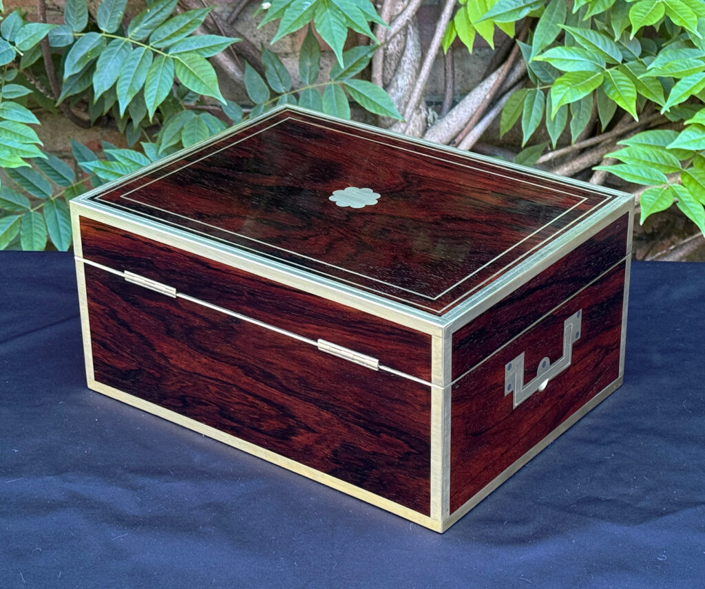 Rear left view of a magnificent antique 1814 dressing case in rosewood by David Edwards.