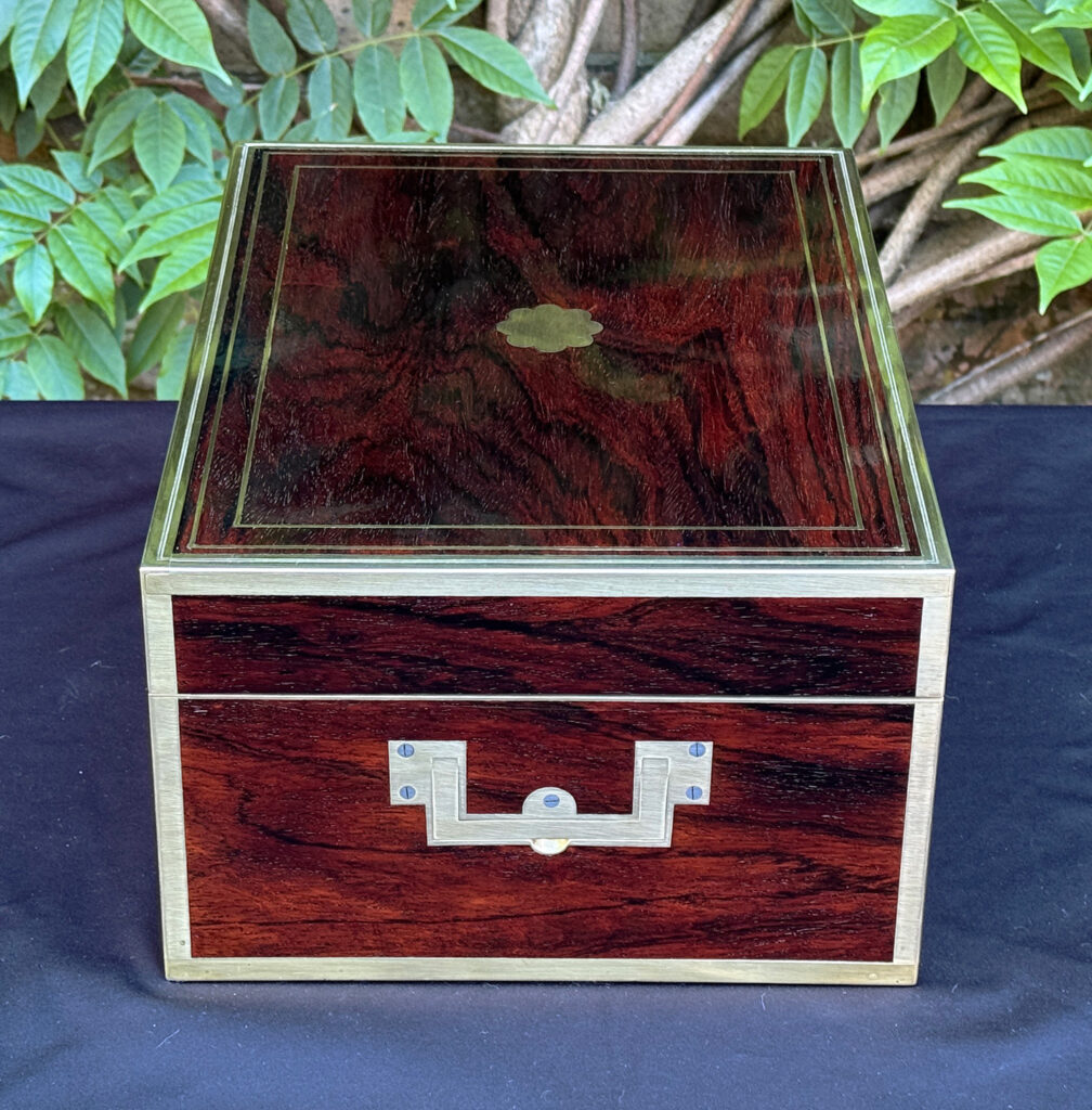 Left side view of a magnificent antique 1814 dressing case in rosewood by David Edwards.