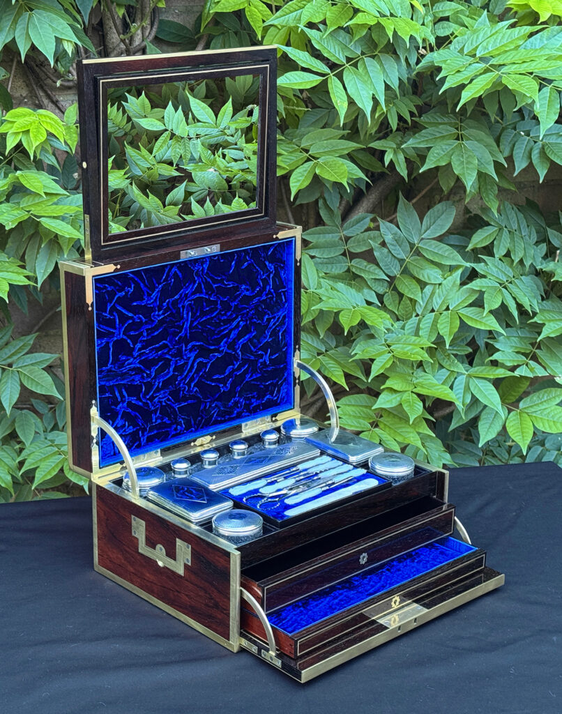 Front left interior view of a magnificent antique 1814 dressing case in rosewood by David Edwards, with mirror fully deployed.