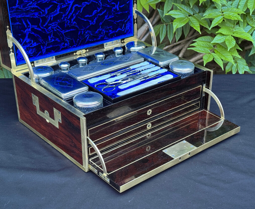 Closer interior view of a magnificent antique 1814 dressing case in rosewood by David Edwards, with front flap opened out.