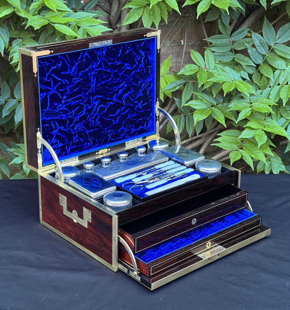 Front left interior view of a magnificent antique 1814 dressing case in rosewood by David Edwards, with both drawers opened.