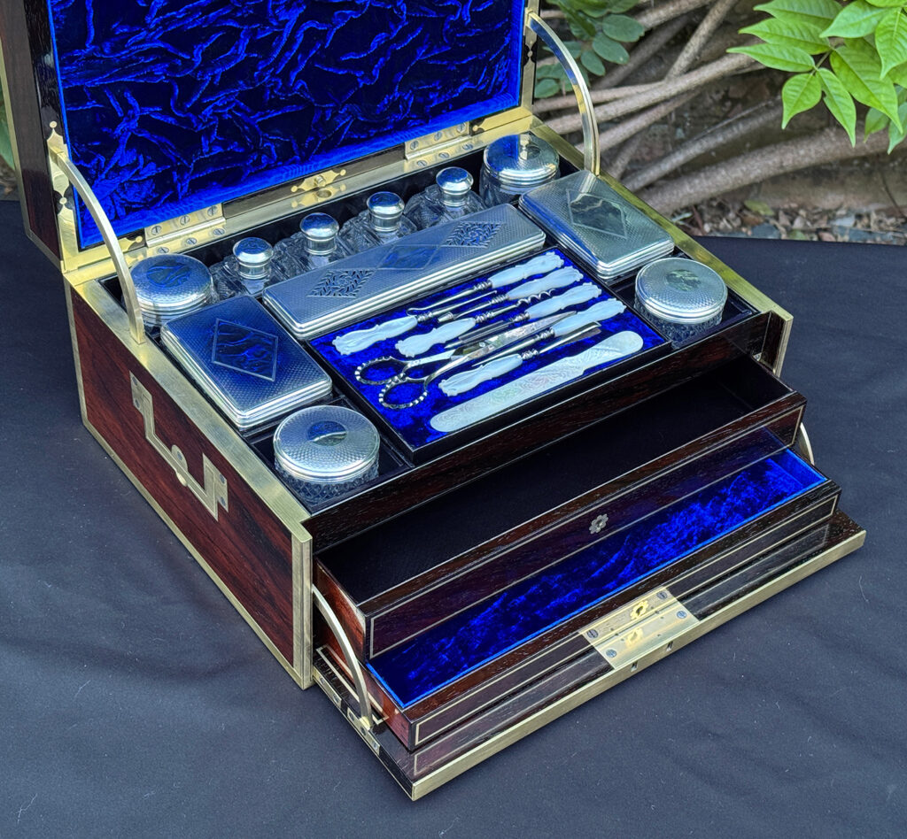 Closer view of a magnificent antique 1814 dressing case in rosewood by David Edwards, with both drawers opened.