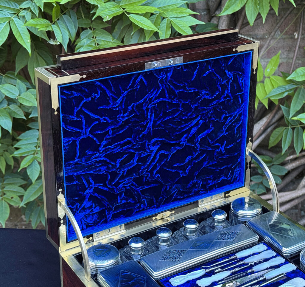 Closer view of the mirror panel semi-deployed from a magnificent antique 1814 dressing case in rosewood by David Edwards.