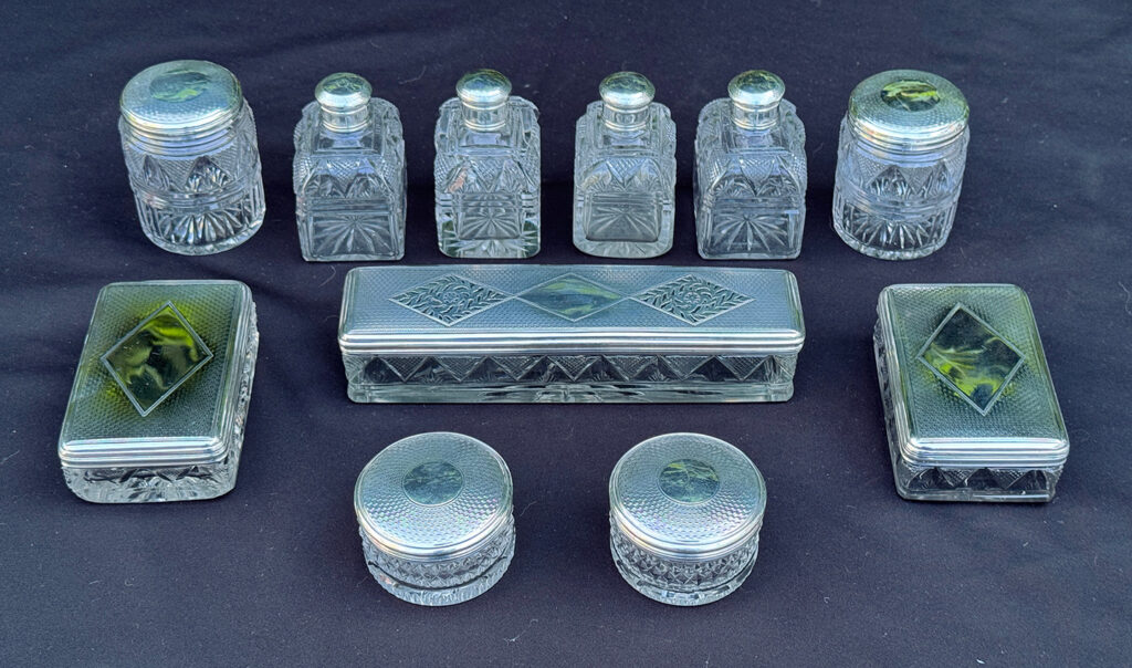 Silver mounted, cut glass vanity bottles and jars from a magnificent antique 1814 dressing case in rosewood by David Edwards.