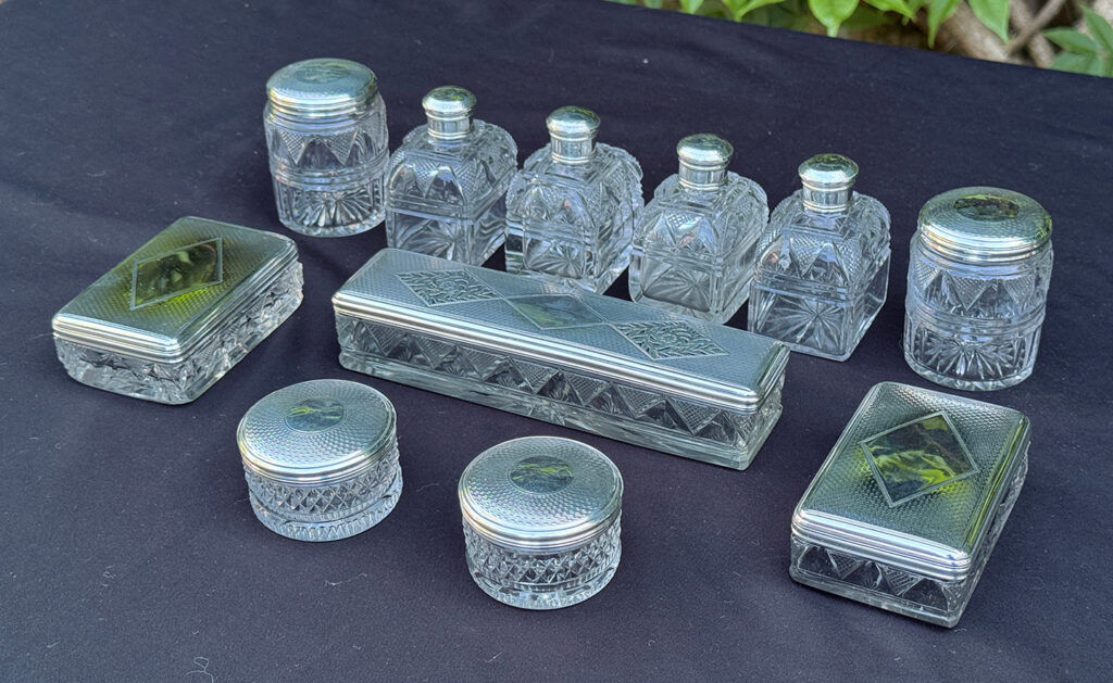 Silver mounted, cut glass vanity bottles and jars from a magnificent antique 1814 dressing case in rosewood by David Edwards.