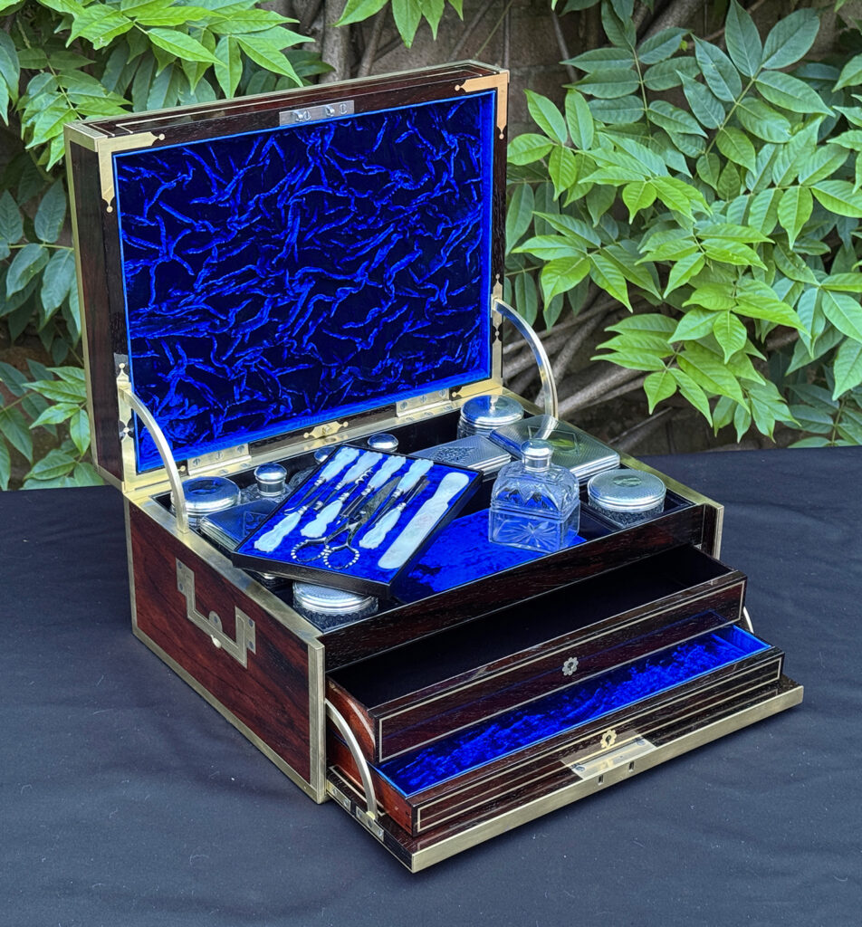 Front left interior view of a magnificent antique 1814 dressing case in rosewood by David Edwards, with the vanity tool tray removed.