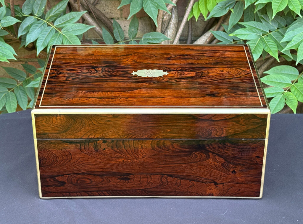 Rear view of an antique document box in rosewood with satinwood interior, by Leuchars.