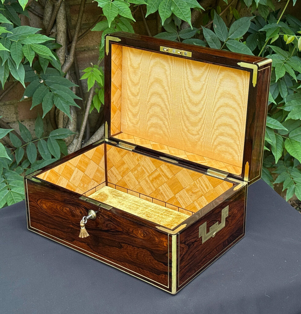 Front right interior view of an antique document box in rosewood with satinwood interior, by Leuchars.