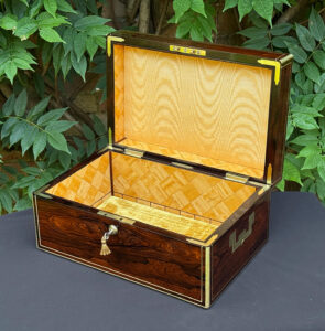 Front right interior view of an antique document box in rosewood with satinwood interior, by Leuchars.