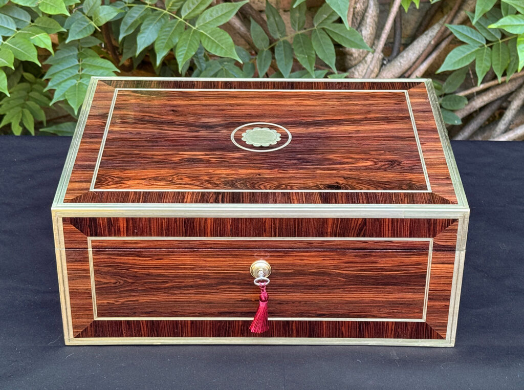 Front view of an antique jewellery box in kingwood, by David Edwards.