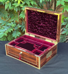 Front right interior view of an antique jewellery box in kingwood, by David Edwards.