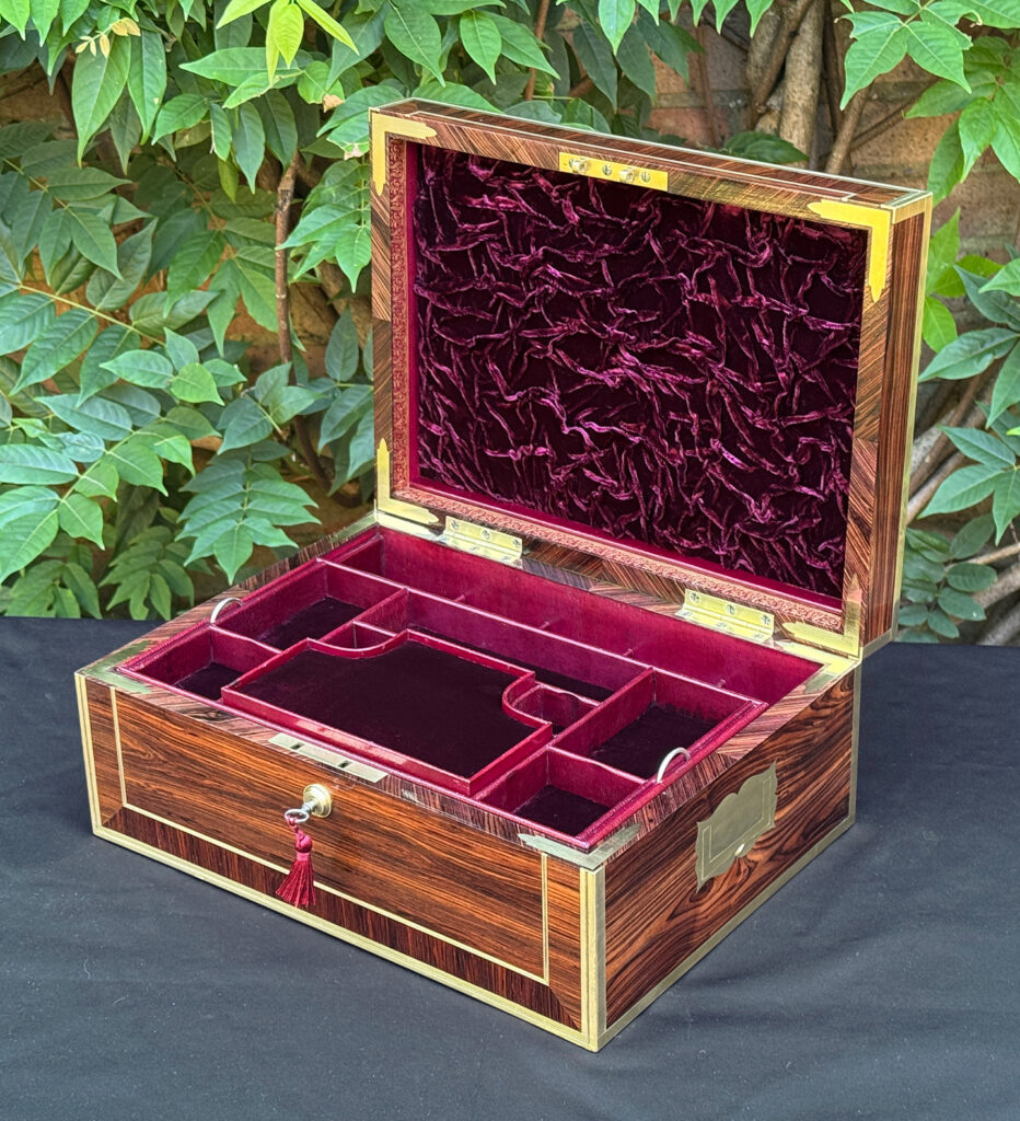 Front right interior view of an antique jewellery box in kingwood, by David Edwards.