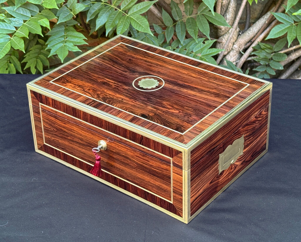 Overhead right view of an antique jewellery box in kingwood, by David Edwards.